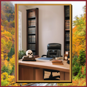 a photo of a skull sitting on a desk in an office. the background behind the photo features beautiful New Hampshire scenery in Fall.