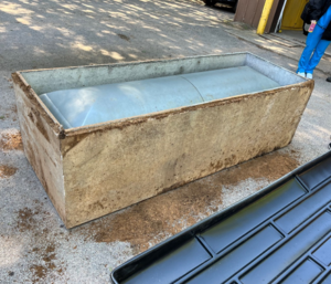 Casket with concrete surround after the exhumation of William Hendricks' remains