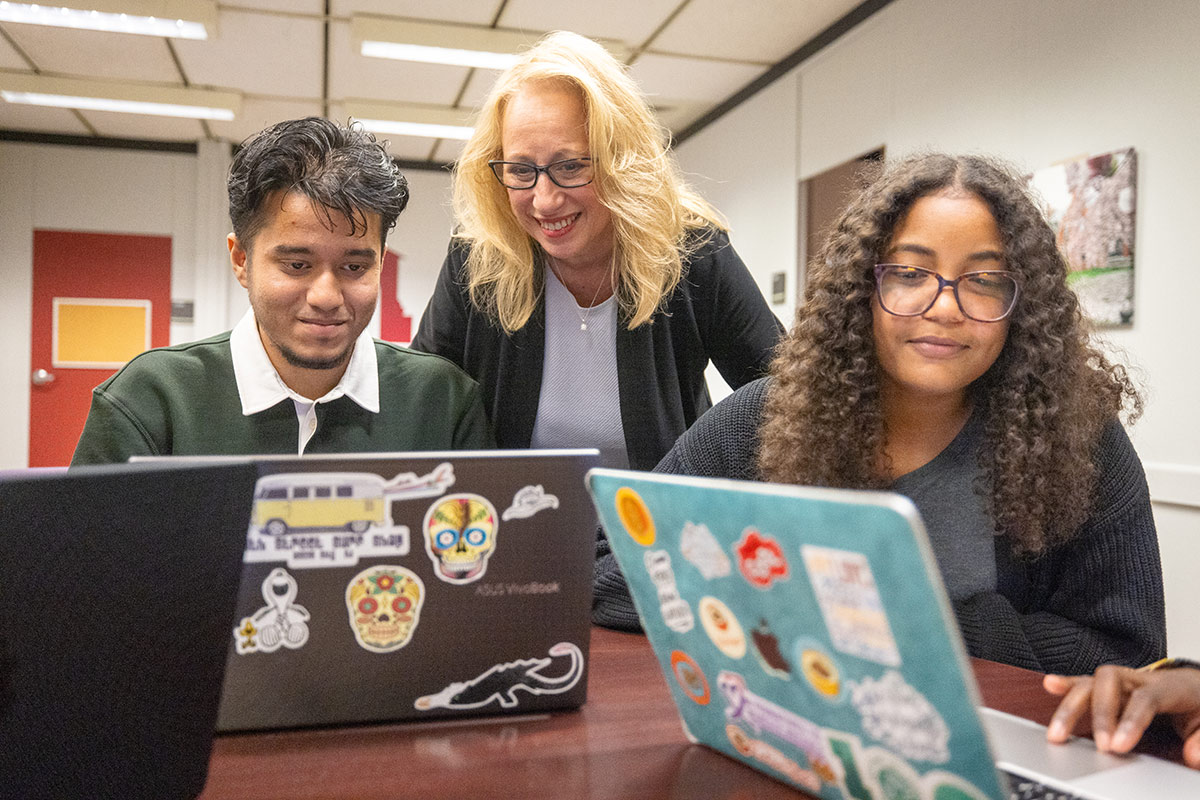 Students work with Senior Assistant Director Cynthia Michalewski