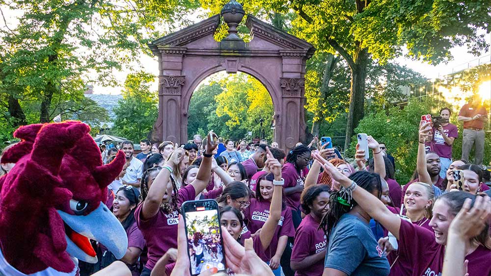 Students partying after the arching ceremony by the Havemeyer Arch