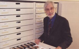 Professor Ira Spar at The Met looking over artifacts.